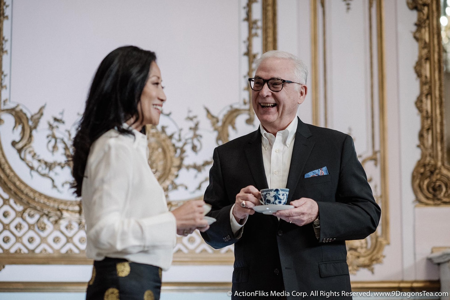 Christy Hui and Bruce Richardson on the set of 9 Dragons Tea