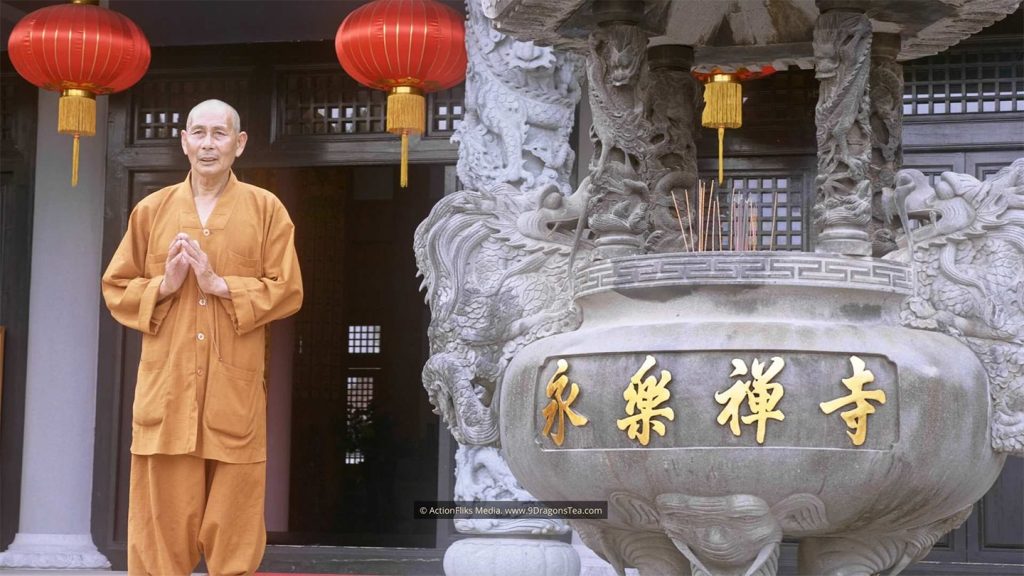 chinese tea history wuyishan culture Buddhist Monk Standing In Front of Mother Temple chinese tea history wuyishan culture Buddhist Monk Standing In Front of Mother Temple
